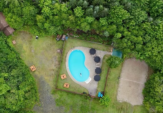 Pool and volleyball court seen from above